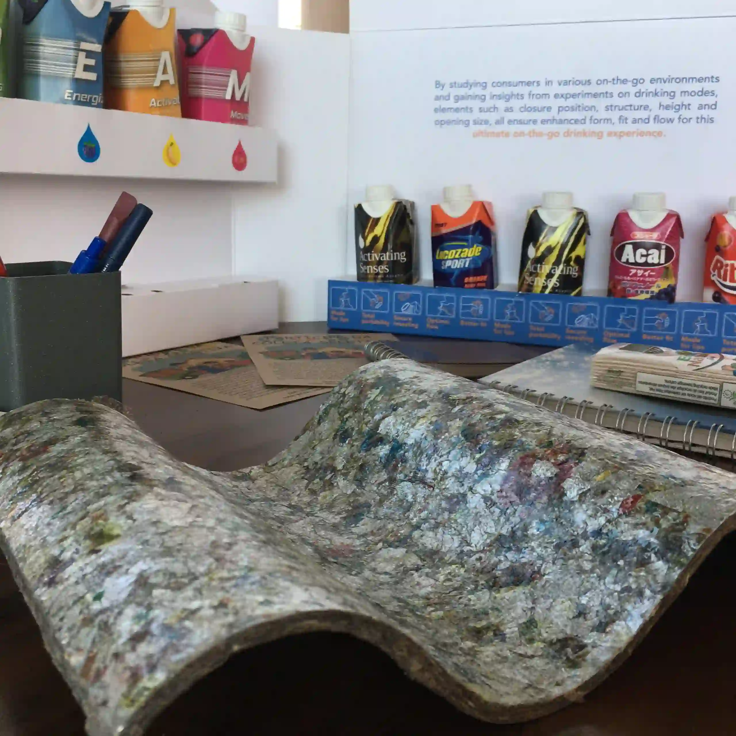 Recycled Packaging Prototype Display Table The PolyAl - polyethylene and aluminium layers - can be used to make molded products such a roof tiles