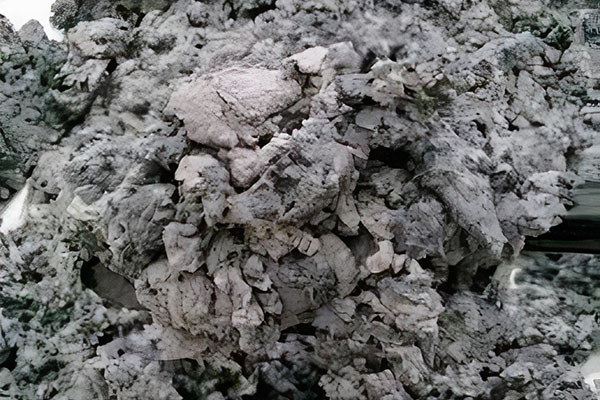 Mound of paper sludge