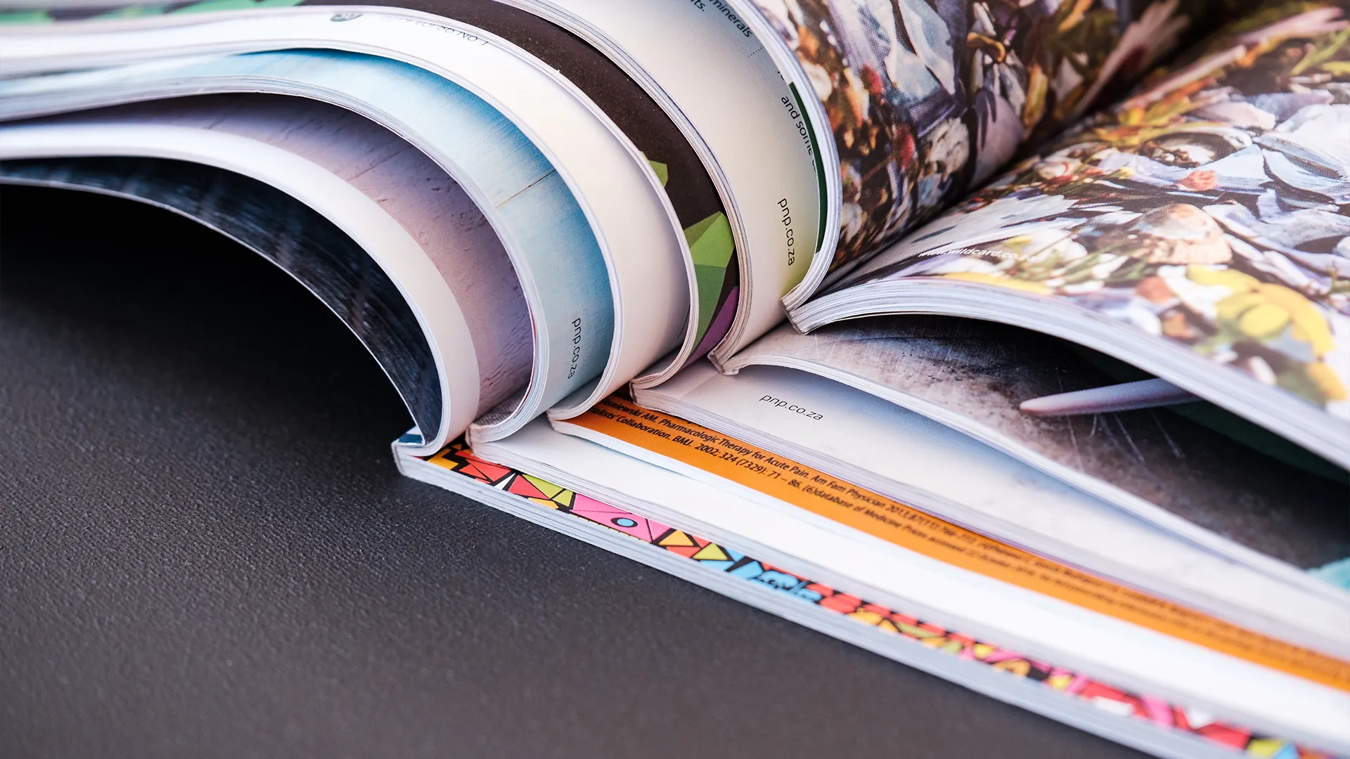 printed paper magazine pages close up