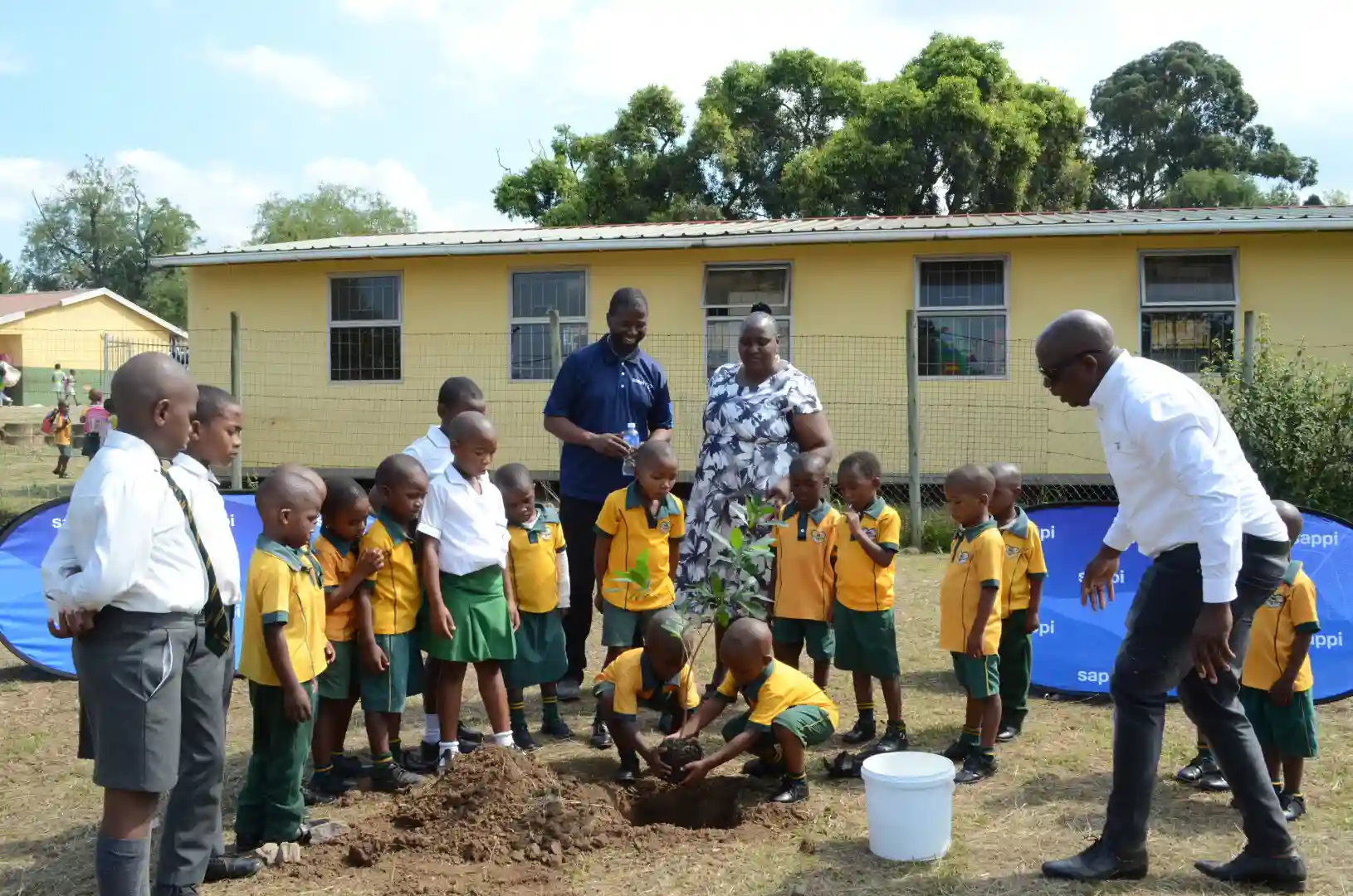 Children Planting Trees