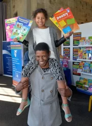 PAMSA-book-fair-attendees-with-educational-materials