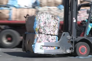 forklift-transporting-baled-recycled-paper forklift-transporting-baled-recycled-paper