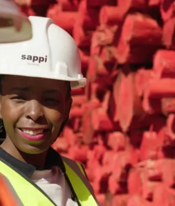 forestry worker logs timber sustainable paper industry