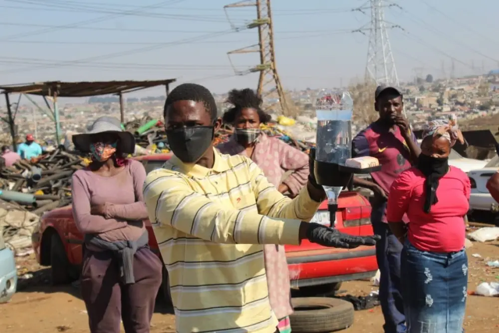 Recycling Workers at Waste Site