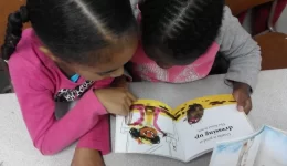 children reading picture book