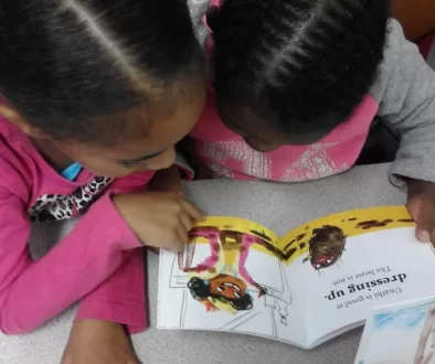 children reading picture book